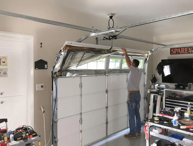 Garage door section replacement by Hanson Garage Door Repair in Hanson