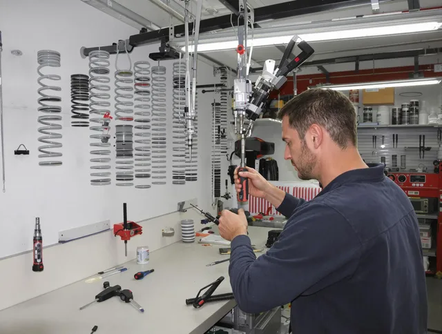 Hanson Garage Door Repair safety certified technician performing precision spring replacement in Hanson