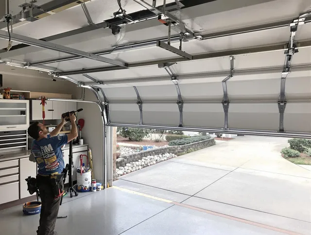 Garage door track repair service by Hanson Garage Door Repair in Hanson